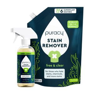 Puracy Laundry Stain Remover bottle and refill pouch with green plant design on dark background.
